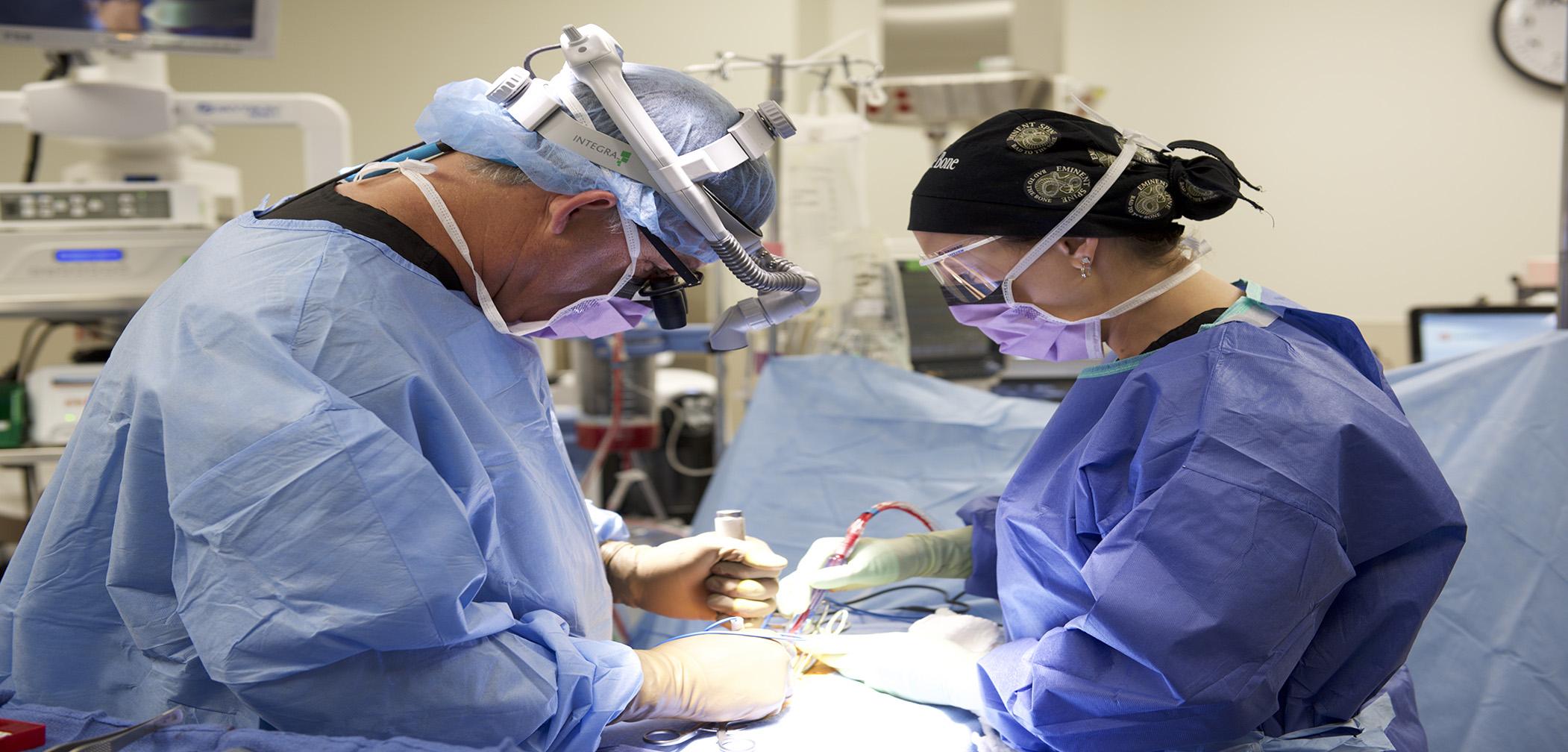 Dr Courtney preformng spine surgery at Eminent Medical Center